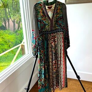 Barely worn. Purchased at Anthropologie.